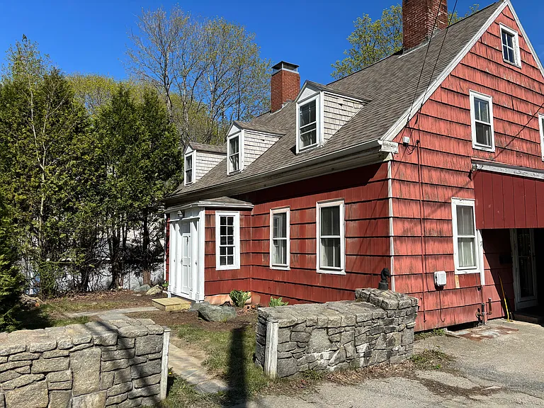 Exterior of the Refuge Recovery Housing residence on a bright day